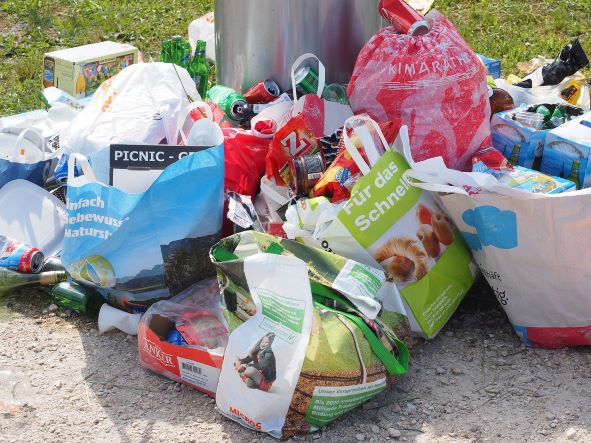 plastic waste in bags on street