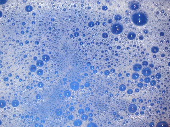 soap suds on blue background